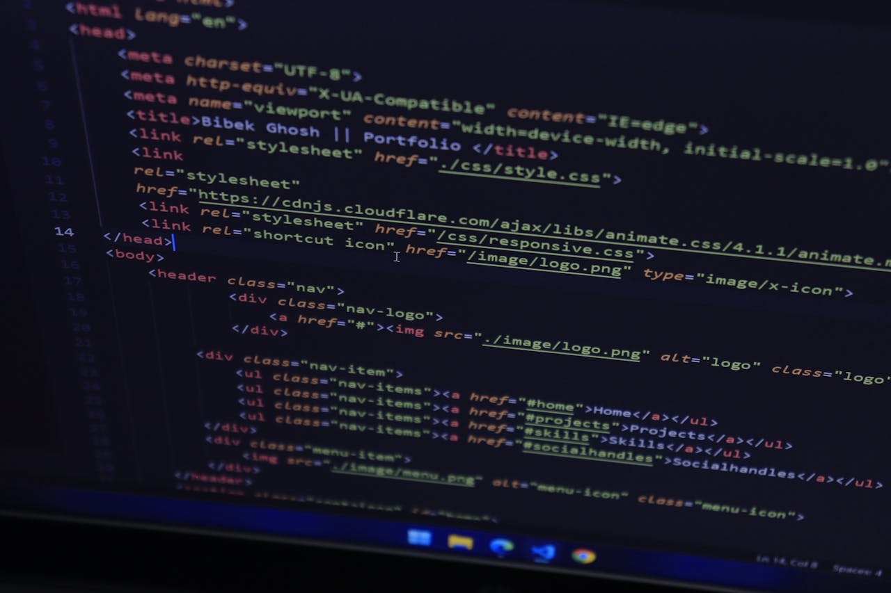 about-us High-resolution close-up of HTML code displayed on a computer screen, perfect for technology themes.